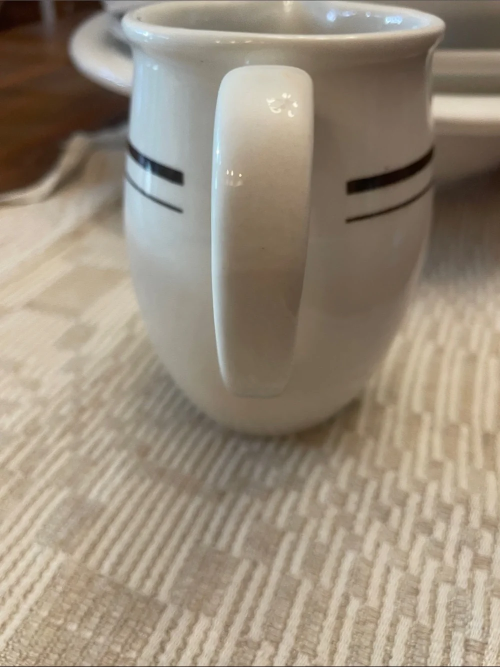 Classic White Ceramic Creamer with Black Stripe Accent
